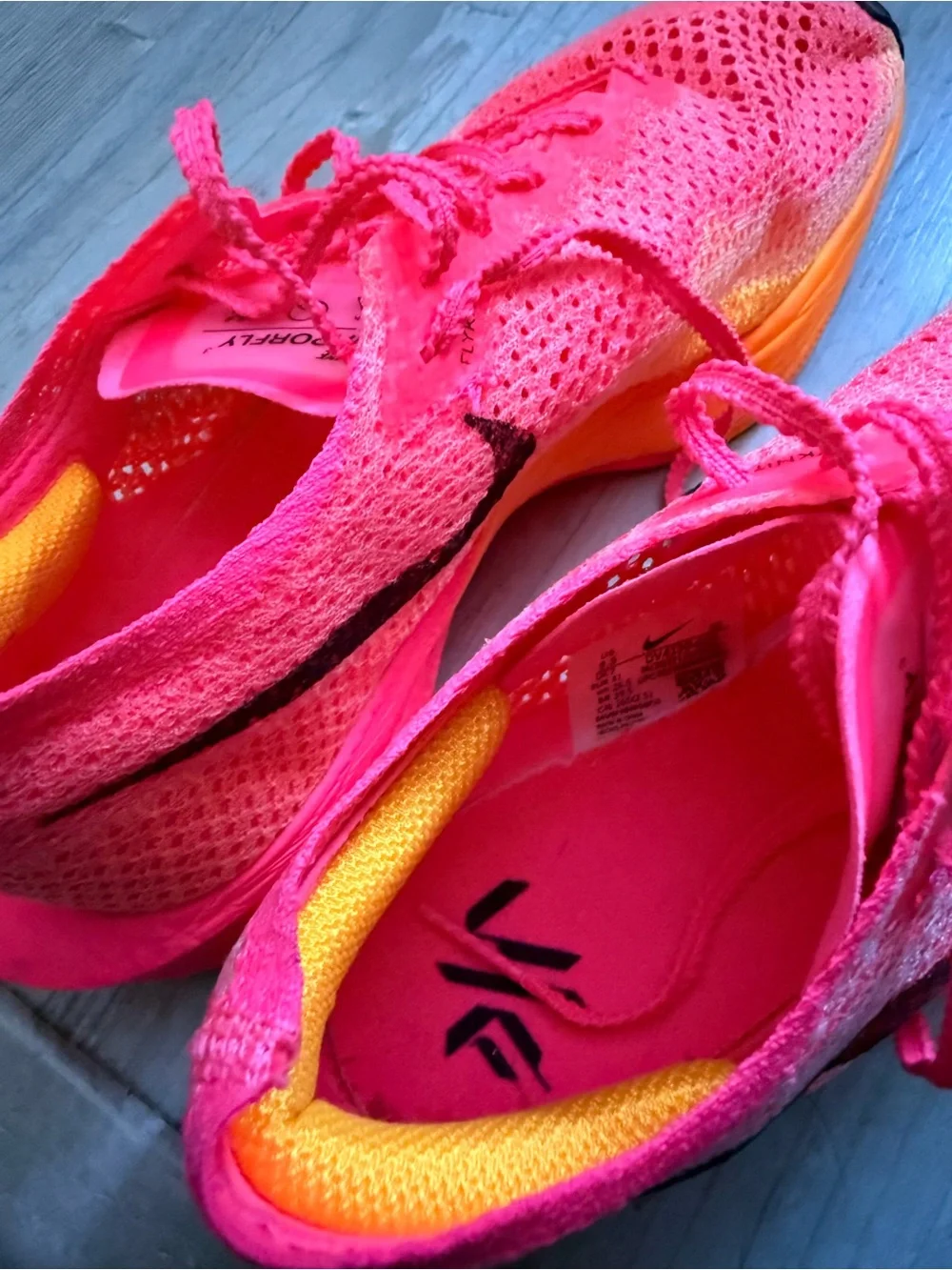 Nike Women’s ZoomX Running Shoes in Hot Pink and Orange